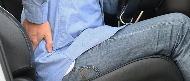 pateint with back injury needing auto accident chiropractor in Irvine