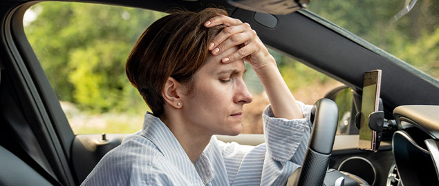 pateint with headache needing auto accident chiropractor in Irvine, CA