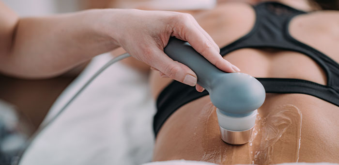 patient receiving ultrasound therapy in Irvine for auto accident injury