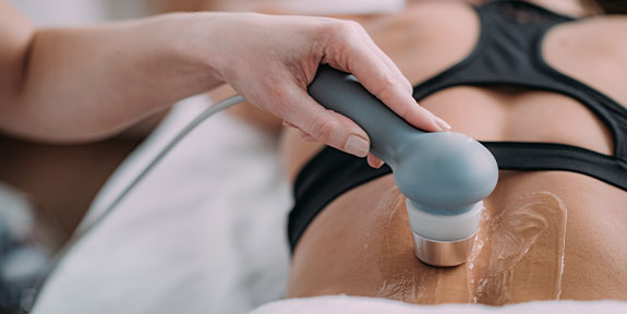 patient getting ultrasound therapy in Irvine for auto accident injury